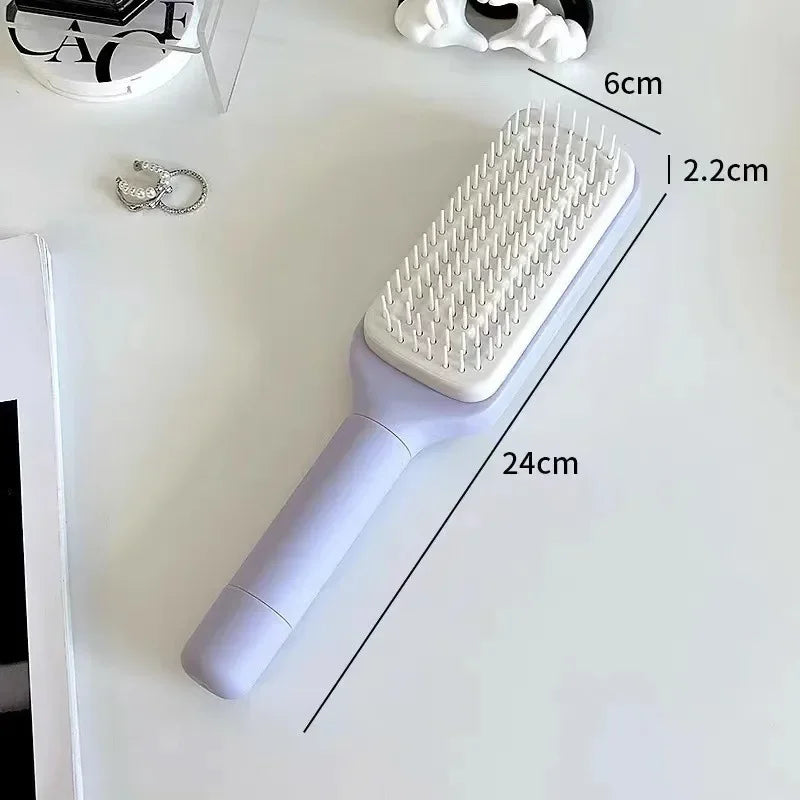 Brosse à cheveux auto-nettoyante
